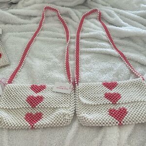 Isaac Mizrahi clutch type heart purse new with tag, priced individually